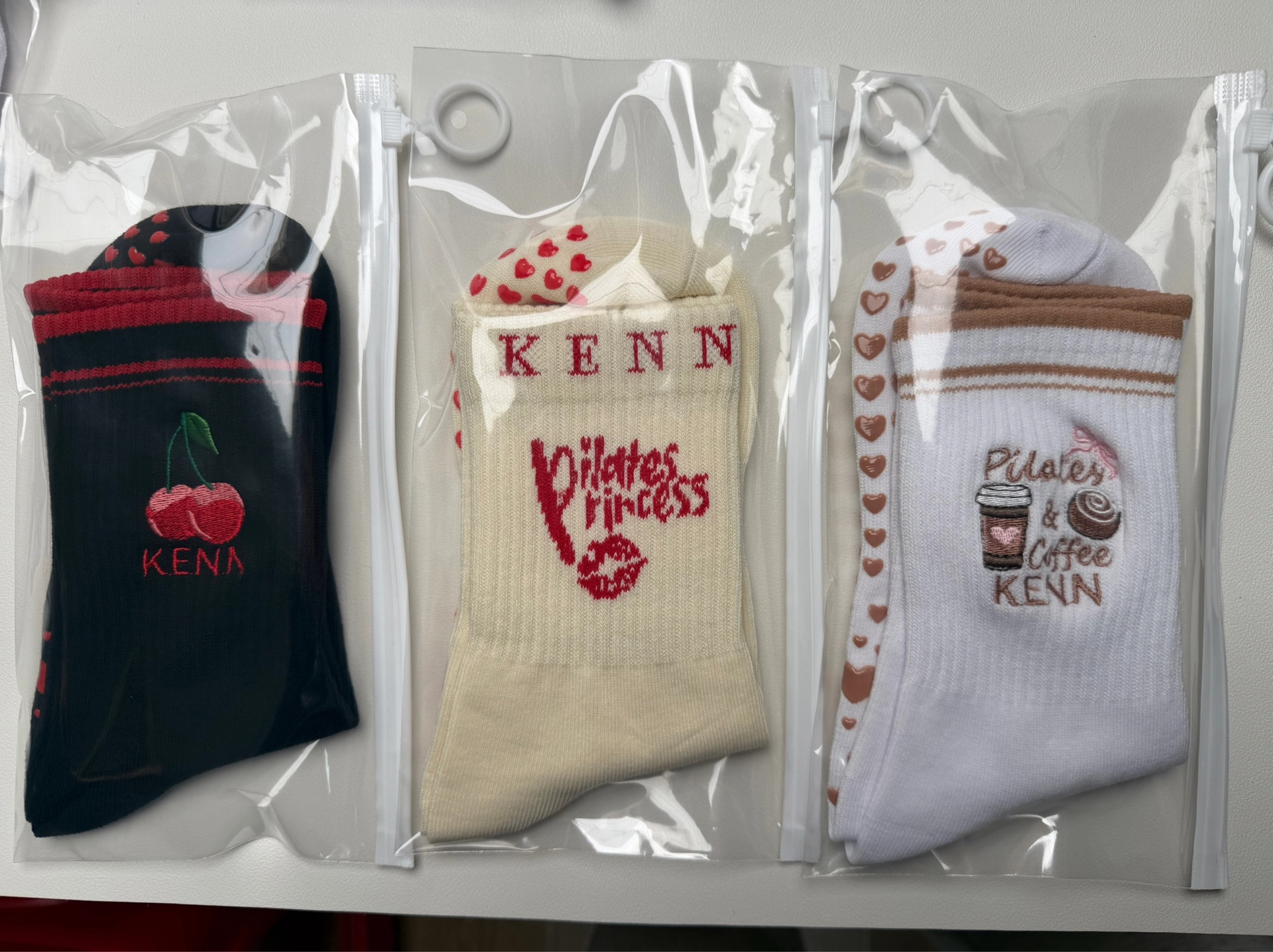 Three KENN; grip socks: cherry, pilates princess and pilates & coffee